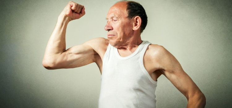 Elder man flexing his arm muscle